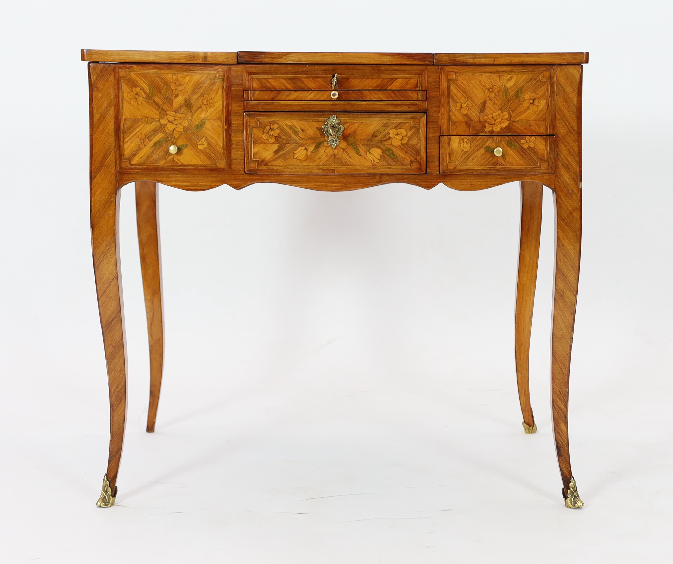 A Louis XV marquetry inlaid kingwood poudreuse, 76cm wide, 46.5cm deep, 71cm high, Please note this lot attracts an additional import tax of 5% on the hammer price